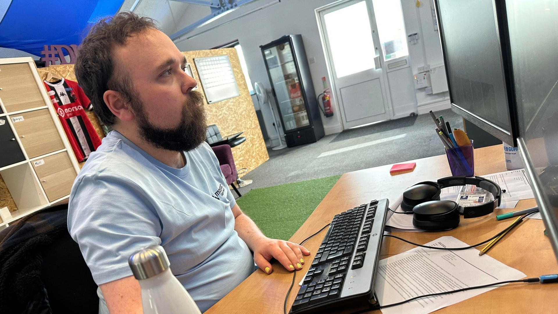 Lead Web Developer Liam working on a website design in Warrington
